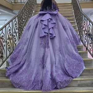 Elegant Purple Quinceanera Dress with Bow Accent